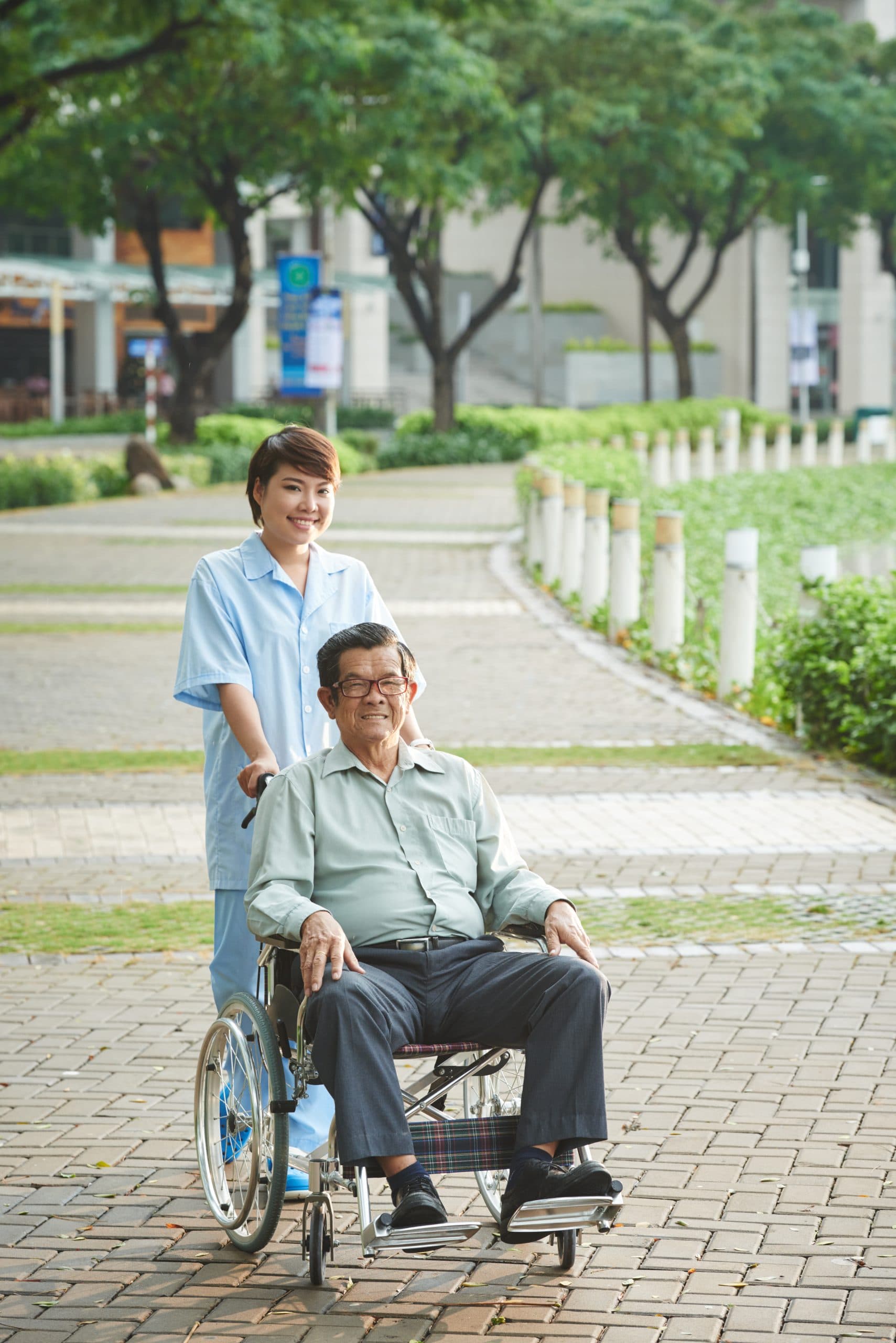 Caregiver walking with a senior resident